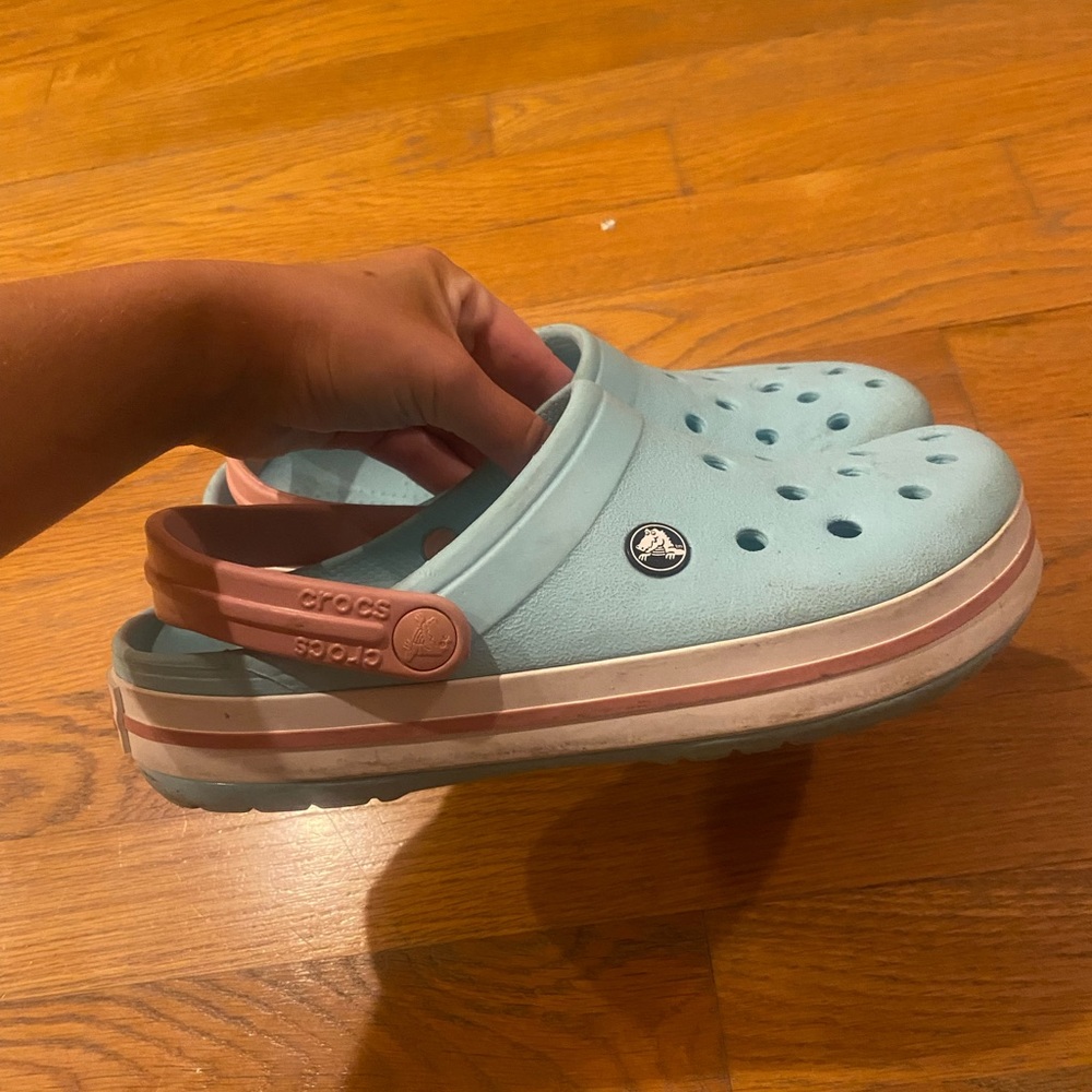 Blue and pink crocs